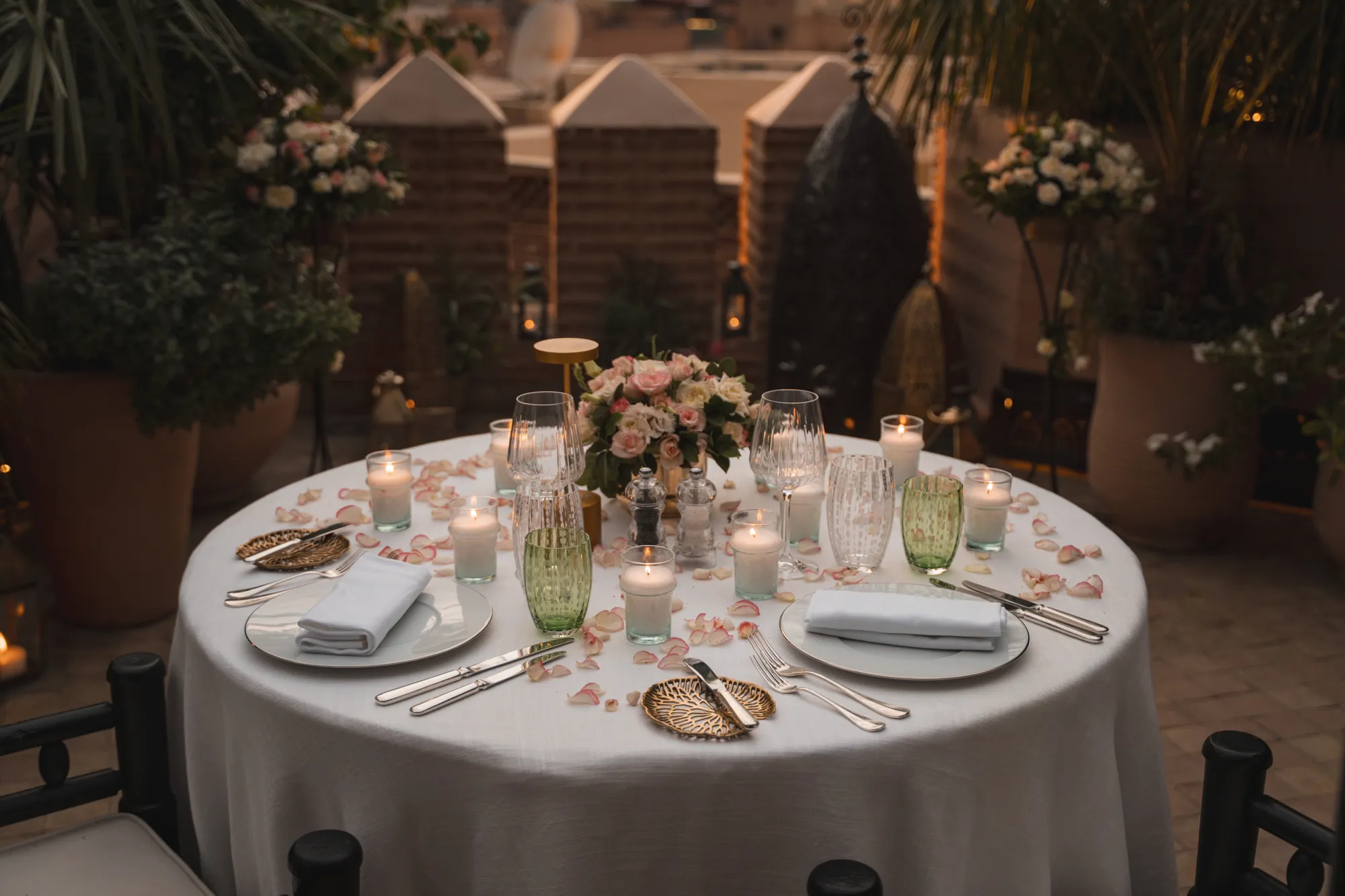 Candlelit table — Rooftop marriage proposal in Marrakech